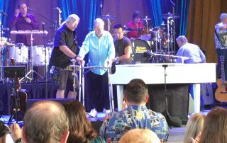 Brian Wilson using a walker to get to piano on tour in 2019