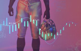 football player holding helmet with graph appearing over top